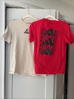 Pair of adidas Kids Red Graphic Tee & Cream Logo Tee. Large plus